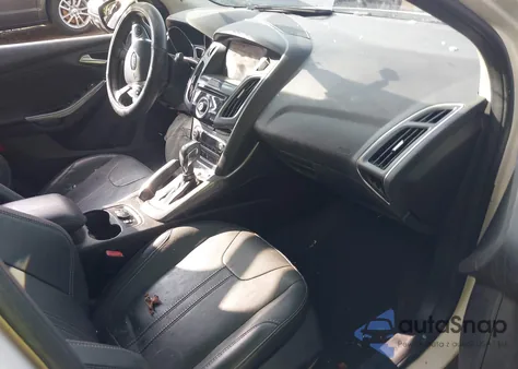 2013 Ford Focus Titanium z USA, uszkodzony, nr VIN 1FADP3J20DL225916